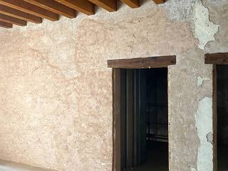 Dettaglio intonaco picchiettato