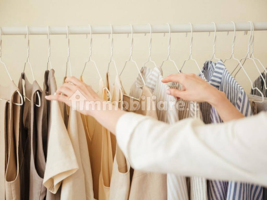 close up of clothes hanging on rack