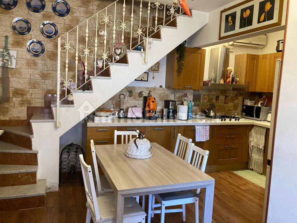 Sala con cucina a vista