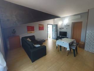 Soggiorno con angolo cottura