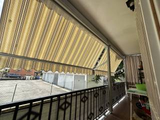 balcone con tende veranda
