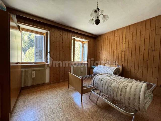 camera da letto casa tre ponti auronzo