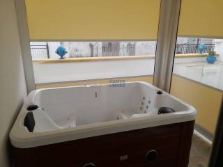 Casa con jacuzzi