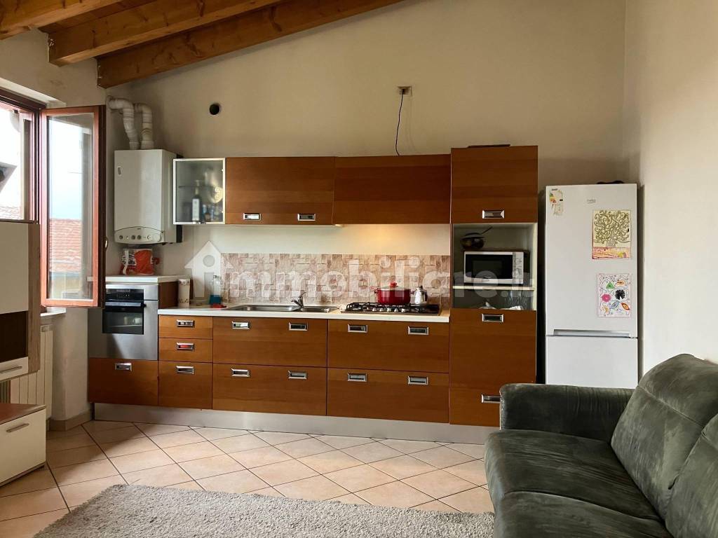 Soggiorno con cucina a vista