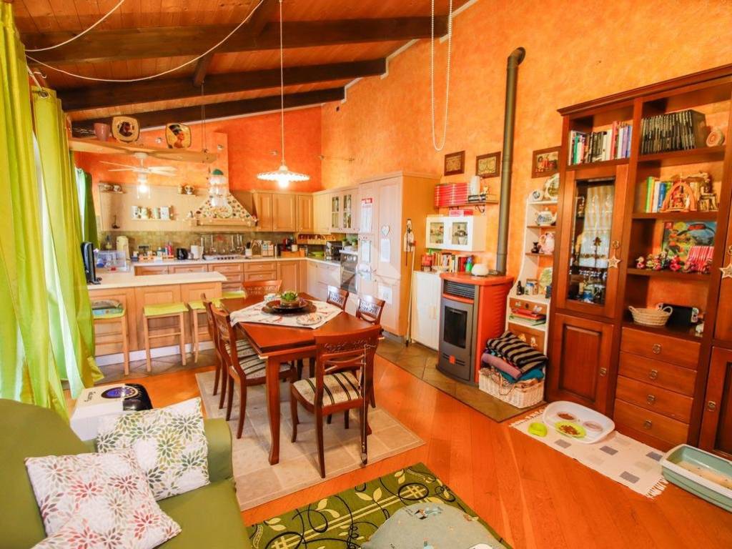 sala con cucina a vista