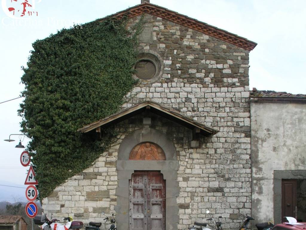 BORGHETTO CON CHIESA ROMANICA