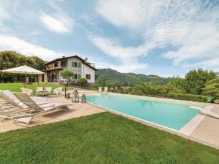 Vista piscina e Villa