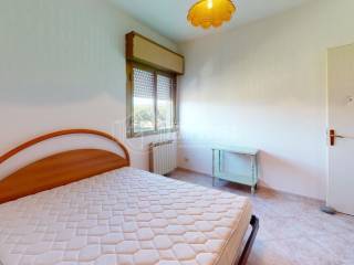 24-Via-Aurelio-Saffi-Bedroom 1