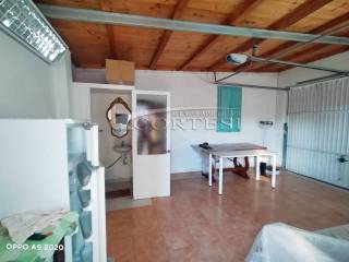 Garage con lavanderia e 2° bagno