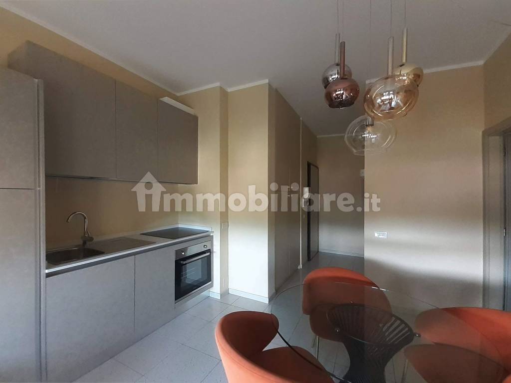 soggiorno living con cucina a vista