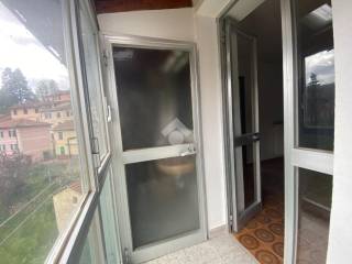 balcone chiuso verandato con accesso al bagno