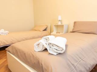 cameretta con 2 letti singoli