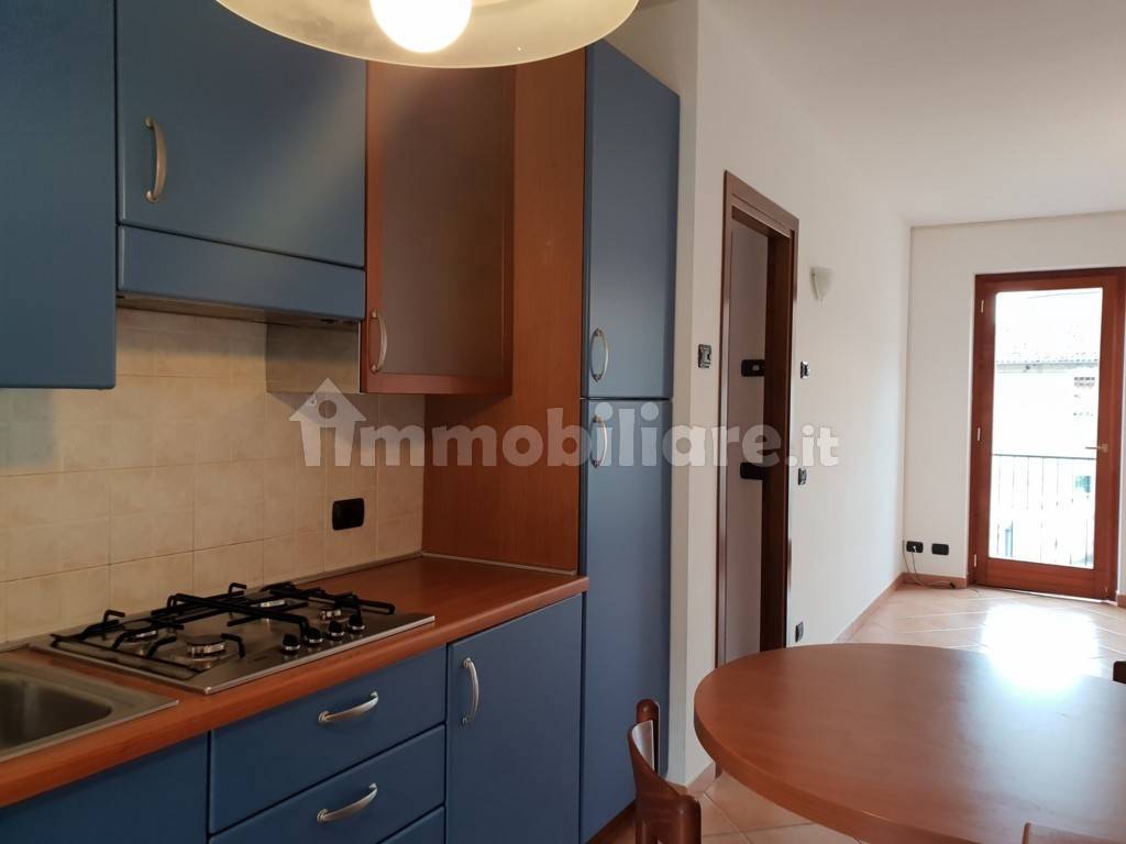 Soggiorno con angolo cottura