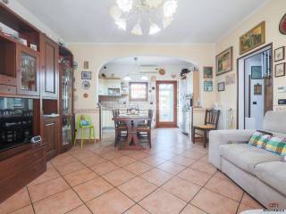 soggiorno con angolo cottura