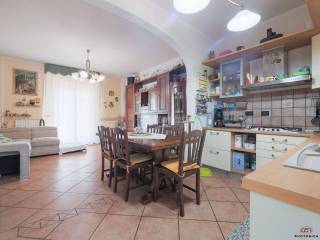 soggiorno con angolo cottura