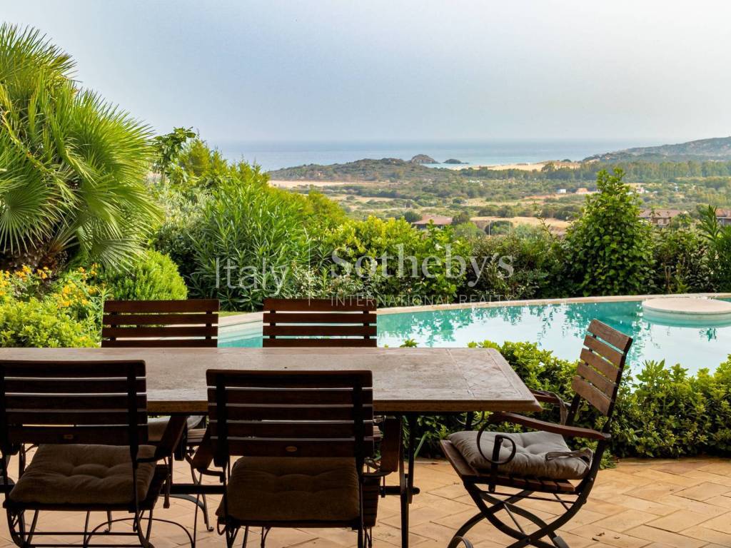 Veranda with sea view and panoramic view on the bay of Chia