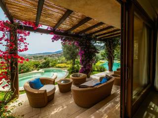 Covered veranda with sea view on the bay of Chia
