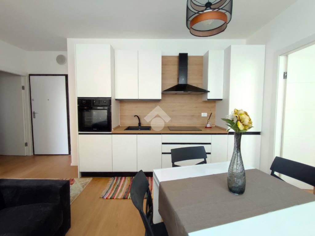 zona living con cucina a vista